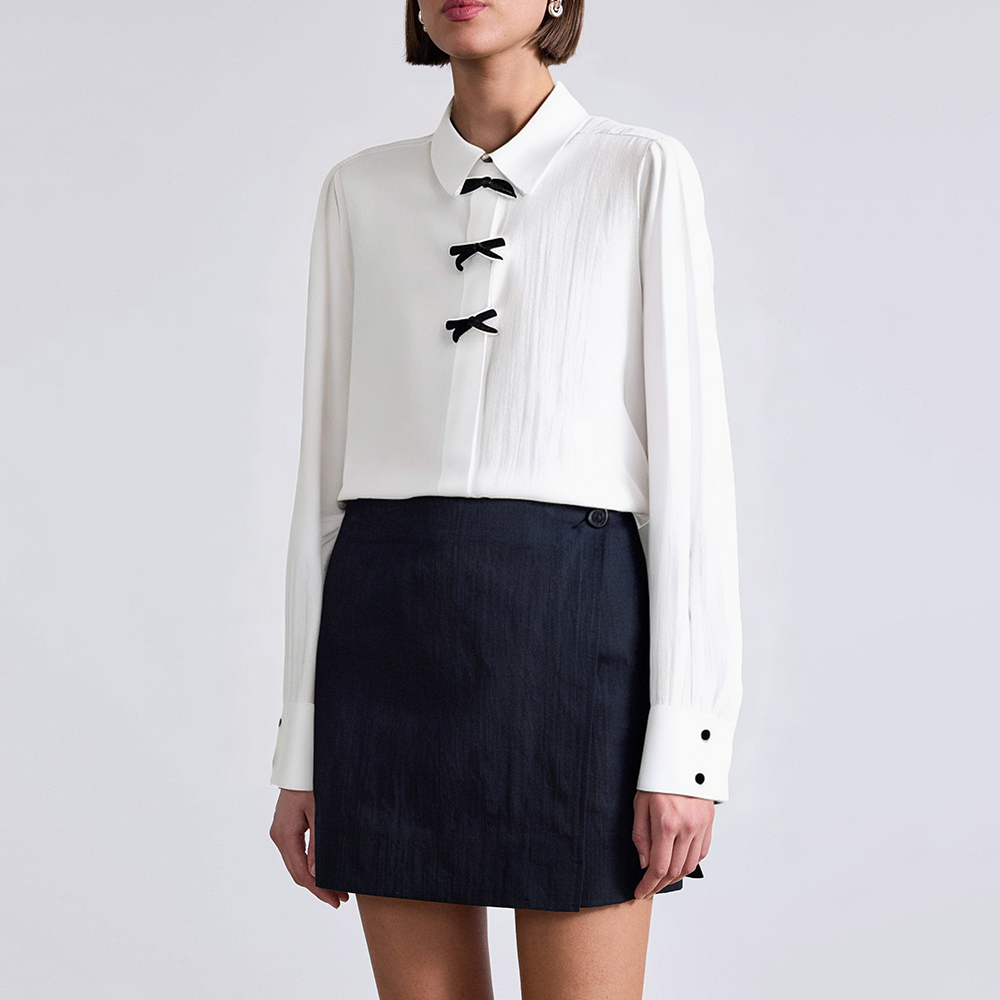 Elegant bow-decorated women's business suit